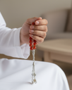 سبحة عقيق طبيعي بعروق بلون جملي